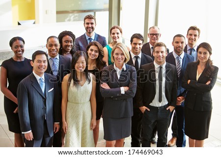 Portrait Of Multi-Cultural Office Staff Standing In Lobby Royalty-Free Stock Photo #174469043