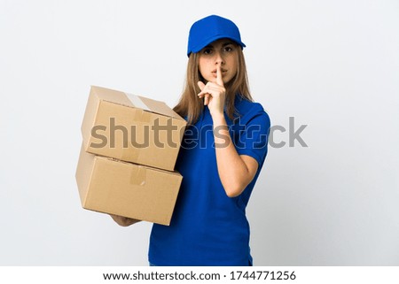 Young delivery woman over isolated white background showing a sign of silence gesture putting finger in mouth