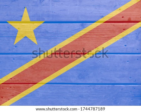 Democratic Republic Of The Congo flag painted on wood plank background