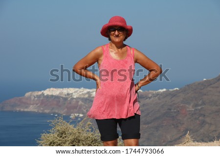Adult woman visit Santorini island, Greece