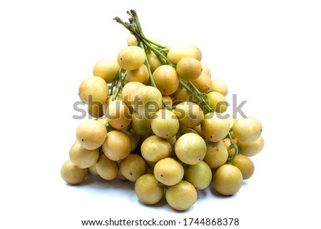 Yellow Rambai has a sweet and sour taste on a white background.