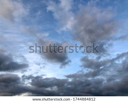 Atmosphere of overcast dusk sky before to rainy. Moody natural weather background. Dramatic storm cloudy and dark sky Royalty-Free Stock Photo #1744884812