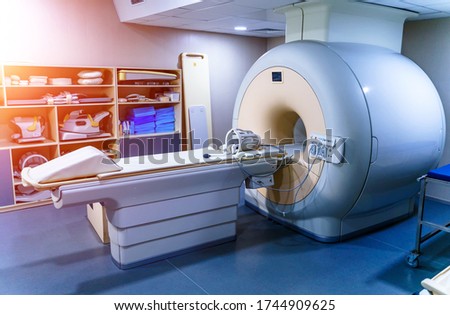 CT Scanner. Computed tomography isolated. Scan room background. Oblique view. Medical technology concept. Clipping path. Royalty-Free Stock Photo #1744909625