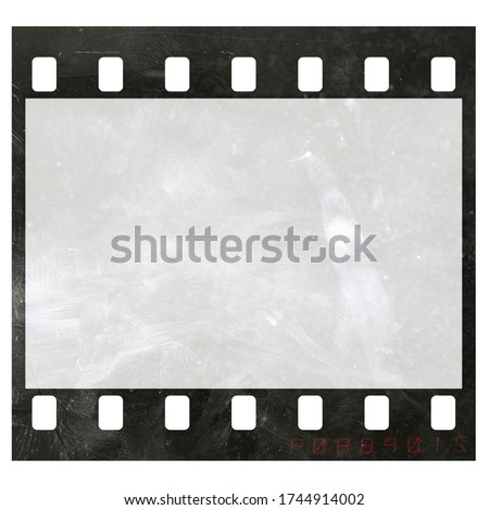 real macro photo of blank 35mm filmstrip with fingerprints and cool frame edge number on white background