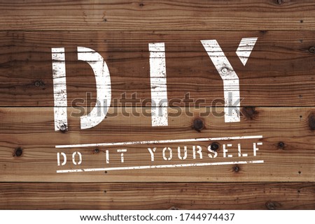 Board written diy with white paint Royalty-Free Stock Photo #1744974437