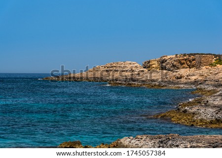 Blue clear sea water on the coast line on Malta