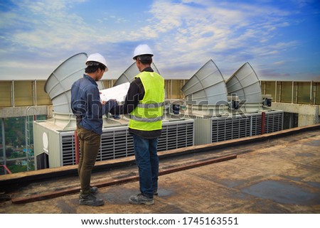 Team of engineer people in group on construction site check drawing and business workflow.construction,engineer,site,management,safety,civil,workers Royalty-Free Stock Photo #1745163551