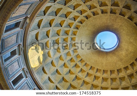 Roman Pantheon with blue sky and sun reflection from cupola hole Royalty-Free Stock Photo #174518375