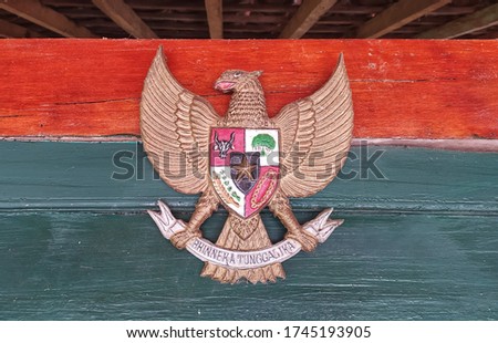 the symbol of Indonesia is Garudauda Pancasila which is made of gold painted wood. very handsome with various philosophical meanings