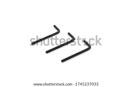 Allen wrench wrenches construction tools white background silver shiny hexagon hexagonal top down angled close up.Hex metal allen L key .
