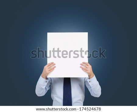 Businessman holding a blank poster 3