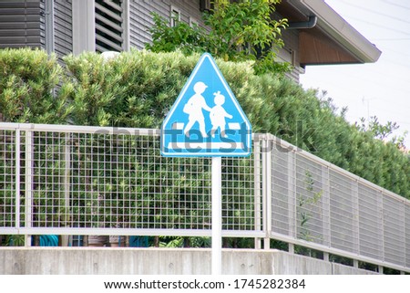 Photo of a sign of a child floating in the air
