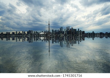 Landscape with reflection of Toronto in a cloud day, View from Toronto island 