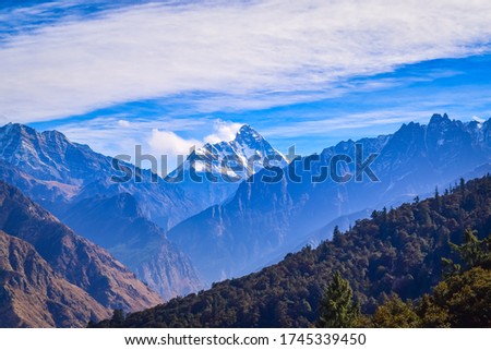 Mesmerizing view at Auli hill station from Kuari pass hiking trail in Uttarakhand,India. Royalty-Free Stock Photo #1745339450