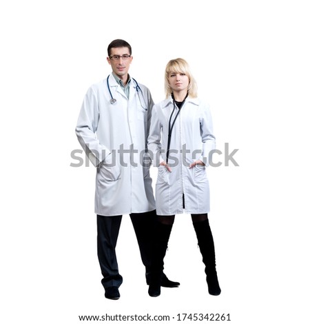 Man and woman in white coats of doctors with stethoscopes on a white background in isolation