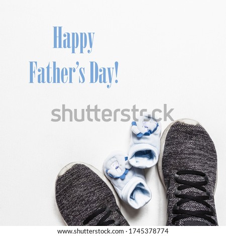 Father's Day. Greeting card with dad and children's shoes. Family. Father's holiday.