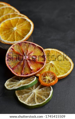 Dried citrus fruits slices mix. Orange, lime and kumquat.