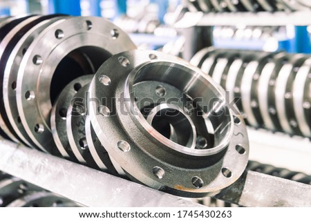 production of metal flanges for valves Royalty-Free Stock Photo #1745430263