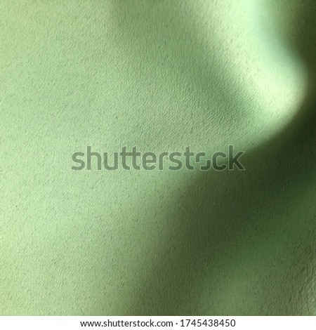 Silk fabric green. Green silk drapery and upholstery fabric for background