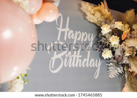 Birthday photozone with pampass grass and color ballons. Photozone for children's holiday. Photozone with text Happy Birthday. Close up photozone Royalty-Free Stock Photo #1745465885