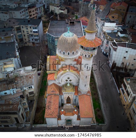 Aerial view of the The Great Mahmudiye Mosque (Carol I) in Constanta city, Romania. Located in the history center of the old town in the city. famous architecture and religious monument.
