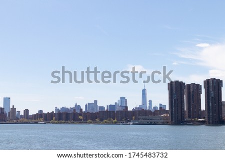 Wide Lower Manhattan Skyline along the East River in New York City