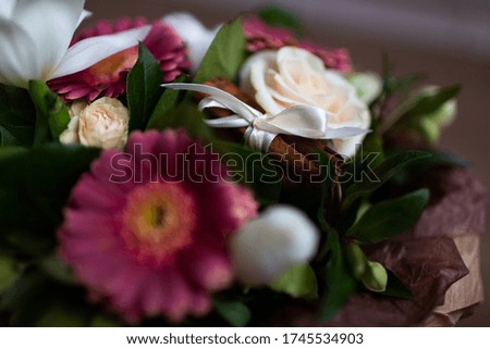 A bouquet of flowers with cinnamon and cotton. Image with selective focus.