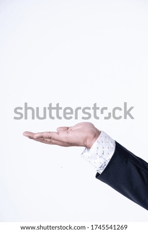 Closed up shot of a man's hand doing hand gesture, seamless white background