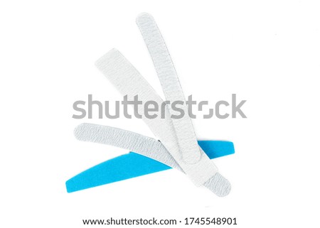 Nail files isolated on white background. The concept of manicure, body care. Creative background, copy space