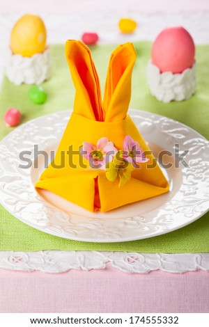 Festive table setting with Easter bunny napkin