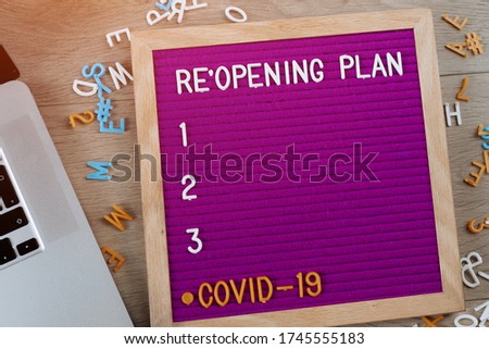 Reopening plan 1,2,3 text on purple letter board. Business concept. Service, restaurant, shop and cafe re-opening. Reopening of the place after the quarantine due to covid-19. Message we're open.