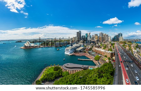 Panorama view of Sydney harbor bay and Sydney downtown skyline with opera house in a beautiful afternoon, Sydney, Australia