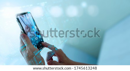 Telemedicine concept,Hand holding smartphone Medical Doctor online communicating the patient on VR medical interface with Internet consultation technology. Royalty-Free Stock Photo #1745613248
