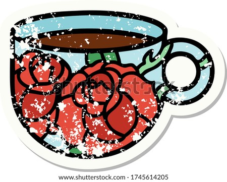 distressed sticker tattoo in traditional style of a cup and flowers