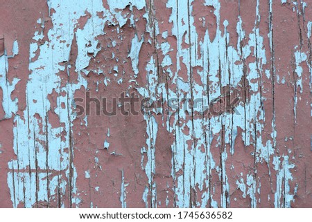 Old painted iron red blue texture background. Grunge rusted metal background. Dirty red metal crack. Cracked paint, rust surface. High resolution photo. Full depth of field.