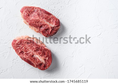 Australia wagyu oyster top blade steak on white background top view space for text Royalty-Free Stock Photo #1745685119