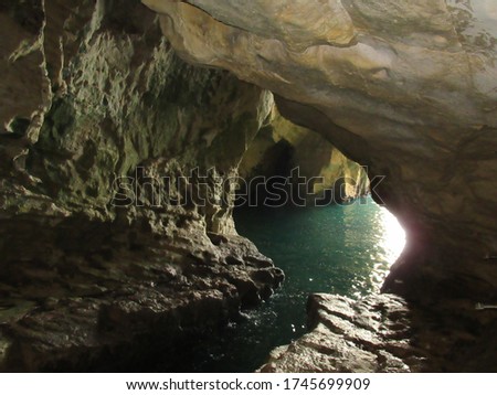 Sunlight filtering in to the grottoes at Rosh Hanikra, Israel
