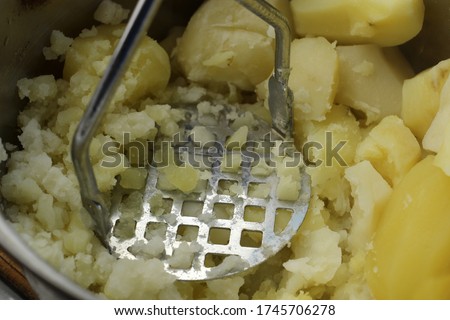 mashed potatoes in a pot. Royalty-Free Stock Photo #1745706278