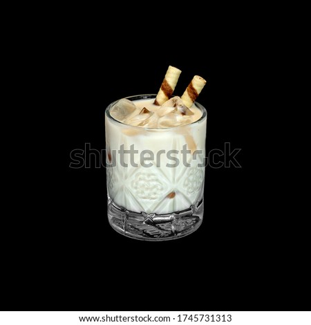 fresh alcohol coctail with candy on the black background