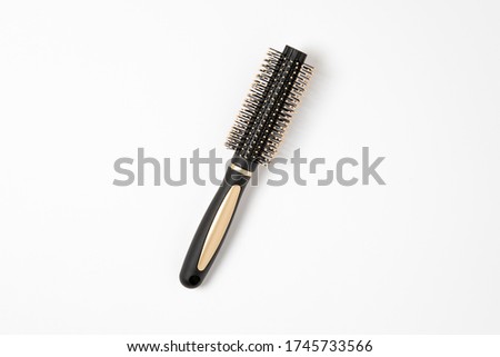 Hairbrush isolated on white background. High resolution photo.Perspective view.