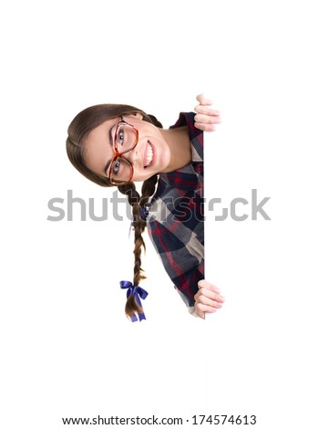 young woman in big optical glasses  with pigtail looking out empty placard