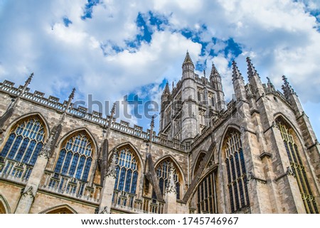 Angled perspective of Gothic Bath Abbey - a parish church of the Church of England and former Benedictine monastery in Bath Somerset England