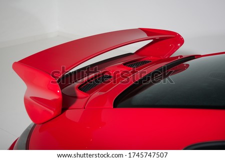 Close up of rear spoiler on sports car Royalty-Free Stock Photo #1745747507