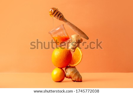 juice of honey, ginger, orange and lemon, symbol of balance Royalty-Free Stock Photo #1745772038