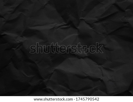 Black crumpled paper texture background Royalty-Free Stock Photo #1745790542