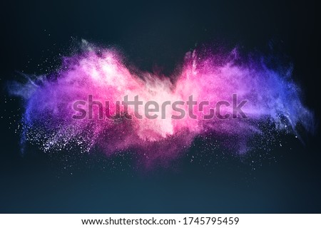 Abstract design of bright colored powder or dust particles cloud explosion and splash with smoke flying over black background