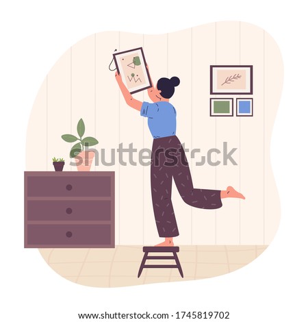Fashionable women decorate interior, select a picture of modern abstract painting.Stylish girl in scandinavian interior.New interior and rearrangement.Modern vector illustration in flat cartoon style. Royalty-Free Stock Photo #1745819702