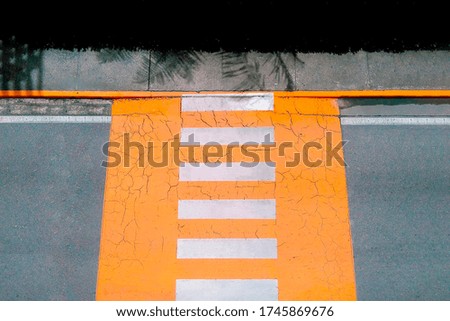 Pedestrian crossing with strong patterns and colors
