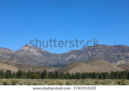 The San Jacinto Mountains are a mountain range in Riverside County, located east of Los Angeles in southern California in the United States. 