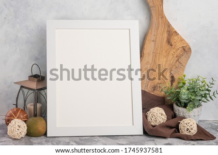 Kitchen background with empty white frame and accessories for design. Lettering and advertising menu, restaurant business, menu for cafe.